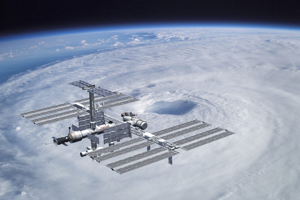 International Space Station Orbiting Over A Hurricane On Earth.jpg