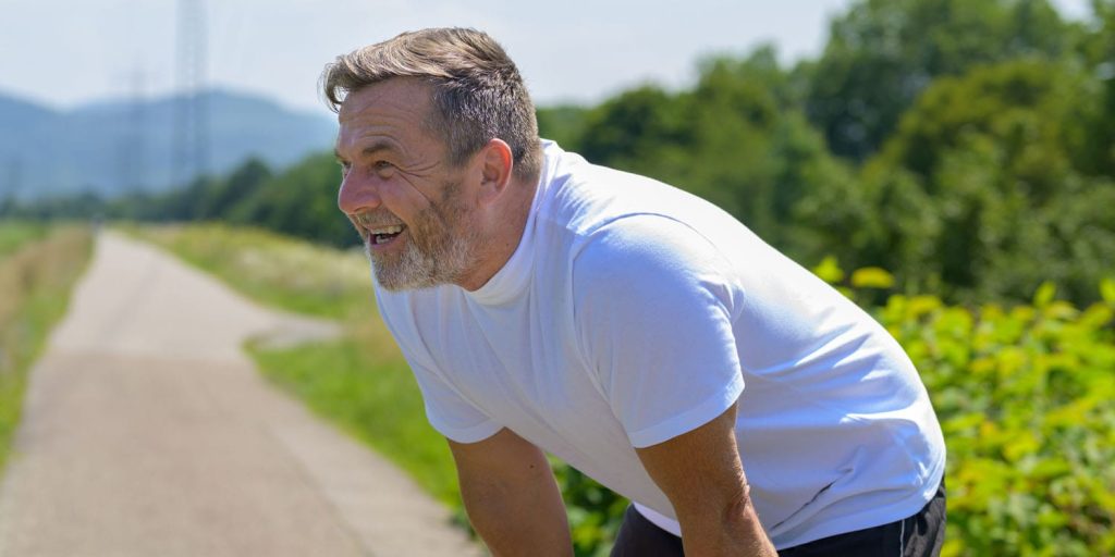 Older Man Jogging Exercising Outside.jpg