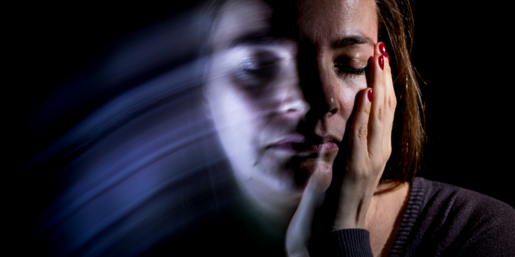 Woman Holding Her Face.png