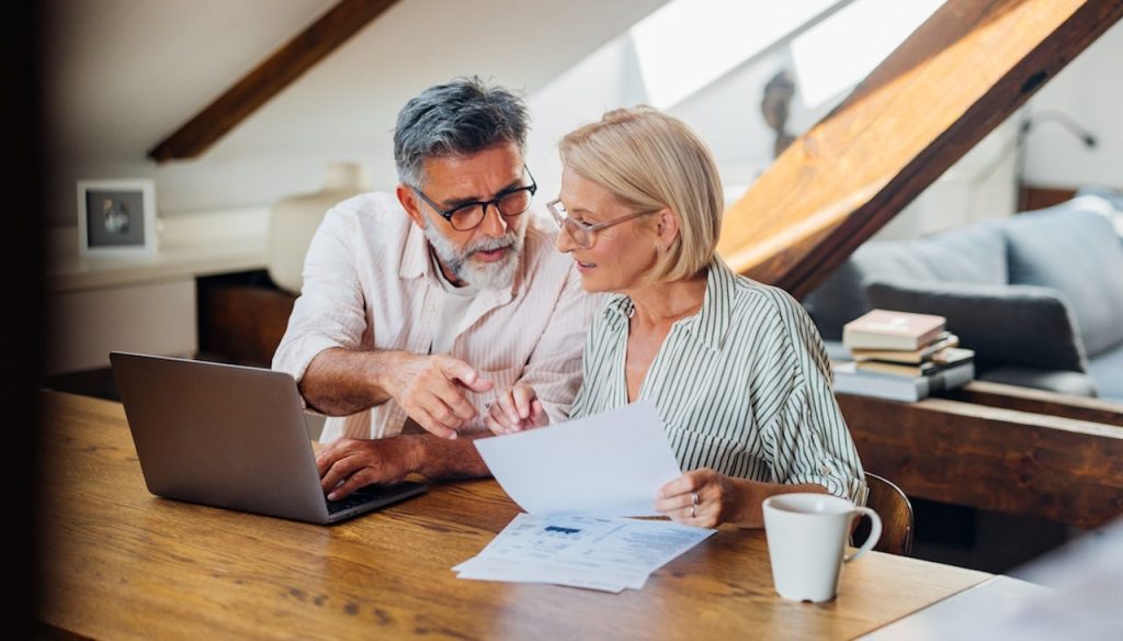 Older Couple Working Documents.jpg