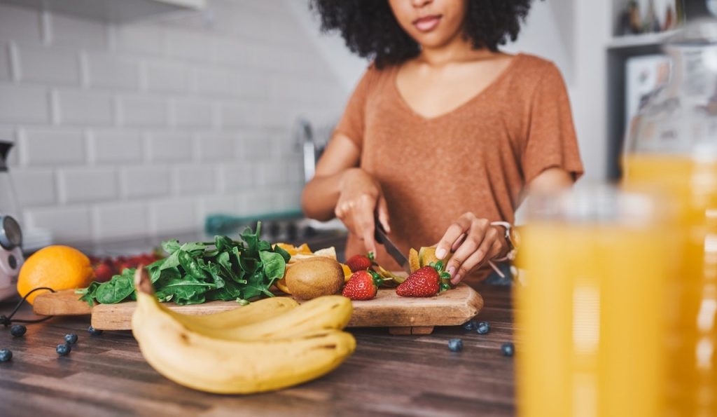 Woman Cutting Fruit.jpg