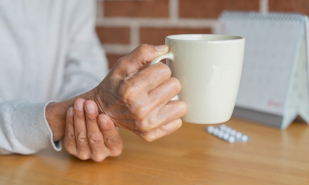 Woman Holding Coffee Mug.jpg