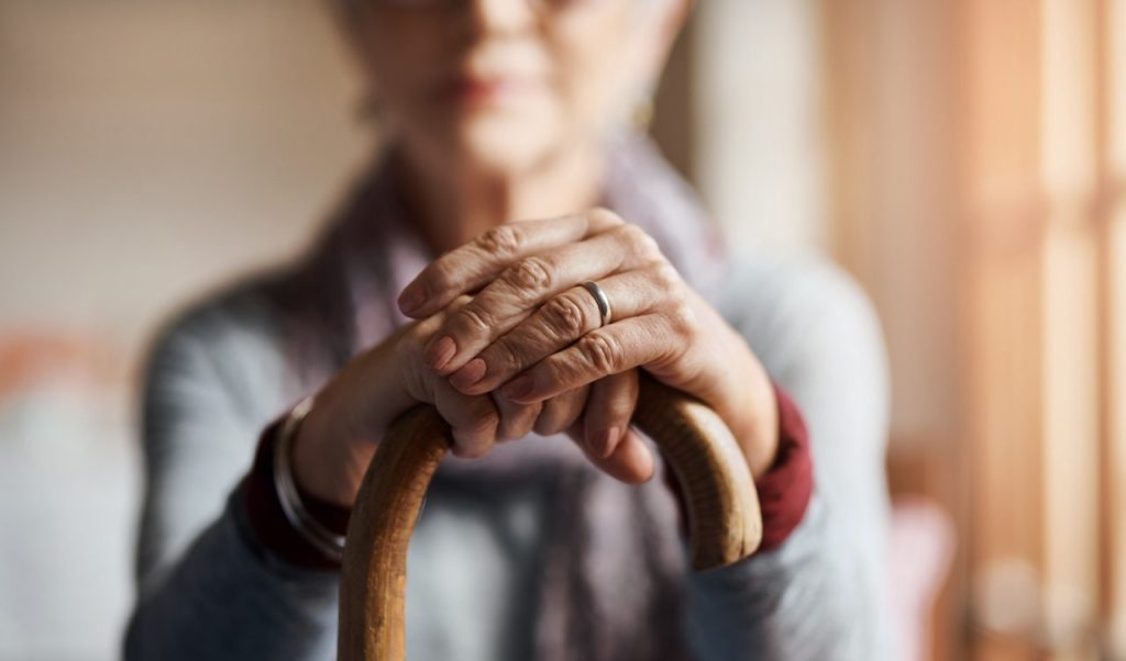 Woman Holding Cane.jpg