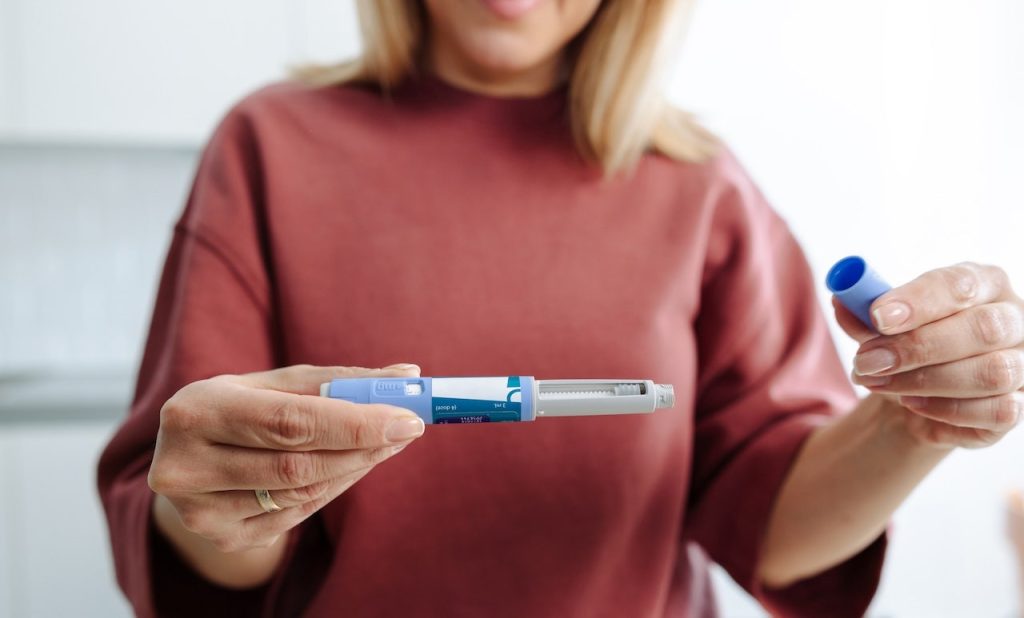 Woman Holding Injectable.jpg