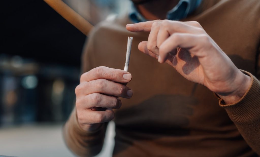 Man Holding Joint.jpg