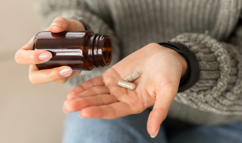 Woman Taking Supplements.jpg