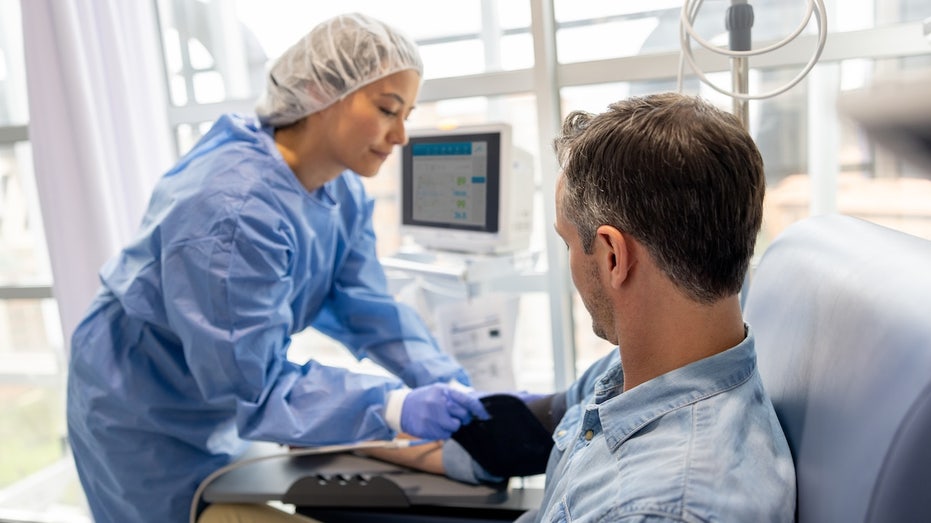 Cancer treatment could be less effective if patients consume popular sweetener Man getting immunotherapy treatment.jpg