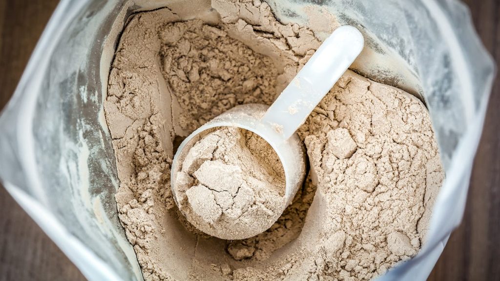 An Expert Explains Why You Can Stop Worrying About How Much Protein You’re Eating Protein powder scoop bag.jpg
