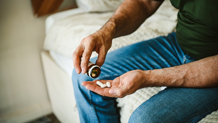 New Wegovy pill offers needle-free weight loss — but may not work for everyone Man pills in hand.jpg