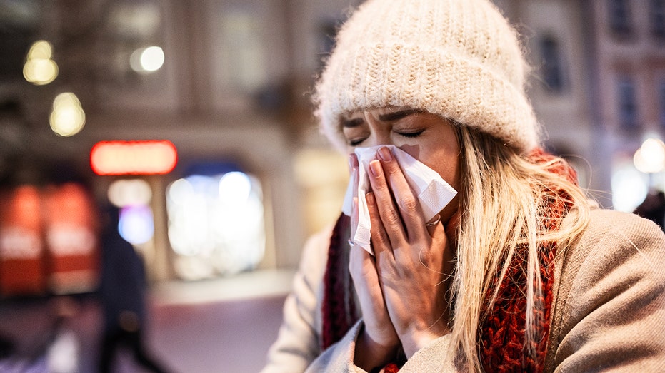 ‘Aggressive’ new flu variant sweeps globe as doctors warn of severe symptoms Sick woman blows nose.jpg