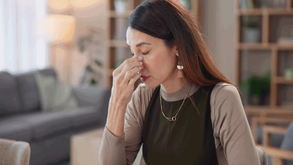 How long you’re contagious with the flu — and when it’s safe to go out Woman feeling sick with flu.gif